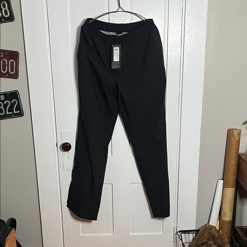 Sun Mountain women XL monsoon pants black stretch, fabric waterproof windproof